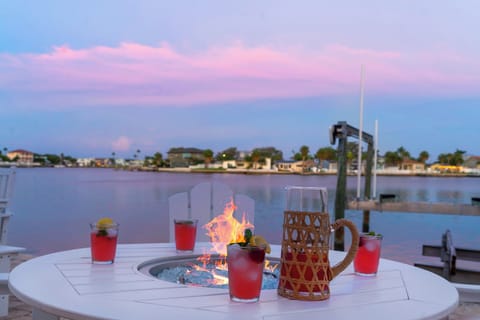 Fire pit, cocktails, and sunsets on the waterfront, what could be more Florida?