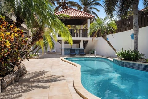 The sparkling private pool is the highlight of Villa Z, offering the ultimate place to cool off under the Caribbean sun.