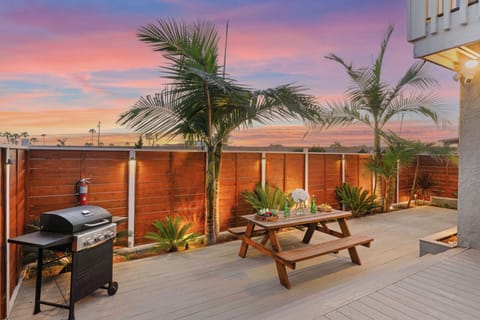 BBQ grill and al fresco dining table.