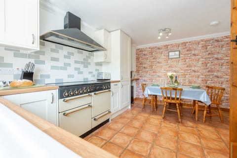 Ground floor: Kitchen/ diner with seating for four