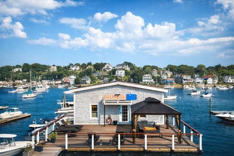 Waterfront boathouse with sweeping harbor views
