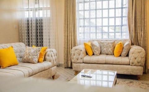 Classic Apartment, City View | Living area | 32-inch Smart TV with digital channels