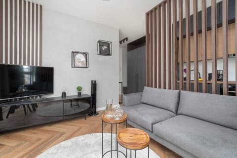 Living room with a comfortable sofa and TV.