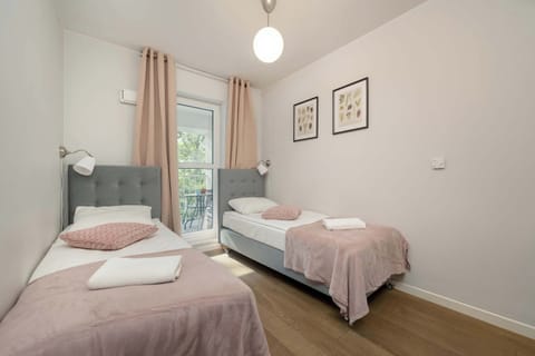 Two comfortable single beds in the bedroom.