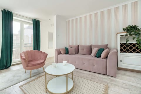 Living room with a comfortable sofa and TV. 