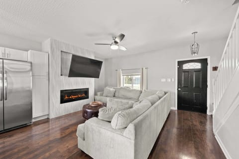 Curl up in the chic living room & stream your favorites on the smart TV