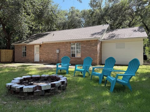 Fenced in yard with firepit 