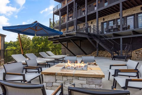 Serene Backyard with Fire Pit & Seating Area  