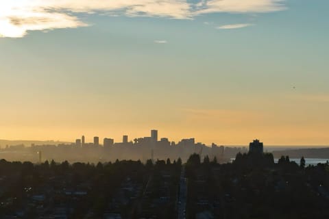 Golden hour magic with stunning city and sunset views.
