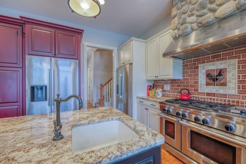 Multiple Sinks, Wolf Oven, Six Burner Stove