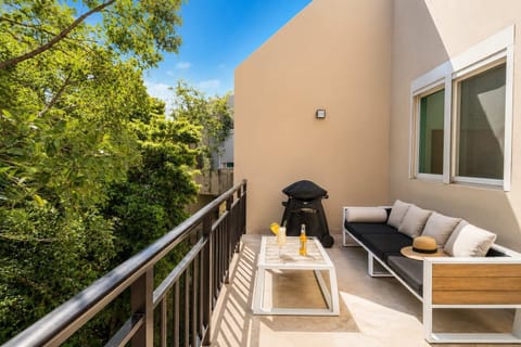 Private terrace with BBQ and outdoor lounge seating