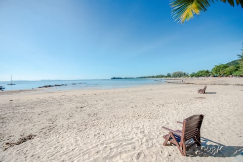 On the beach, sun loungers, beach massages