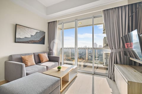Apartment, 2 Bedrooms, City View | Living area | 43-inch Smart TV with cable channels, Netflix, streaming services