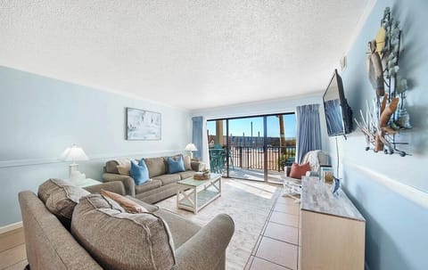 Open concept living area with stylish furnishings