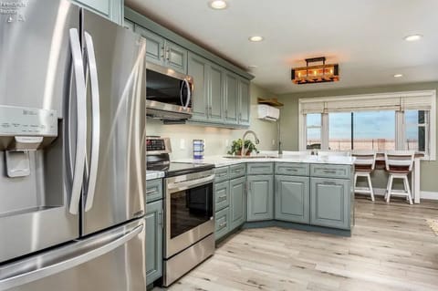 fully stocked kitchen with air fryer and Vitamix