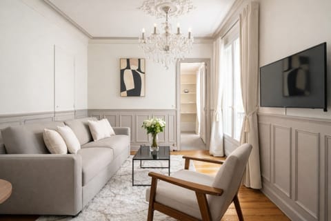 Deluxe Apartment, Courtyard View | Living area | 80-cm Smart TV with digital channels
