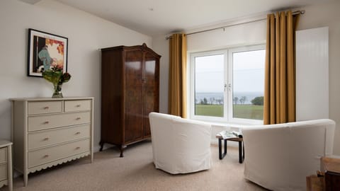 The Apple House - the seating area in bedroom two for taking in the sea views