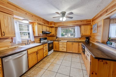 Warm, wood-accented kitchen with everything you need for daily meals.