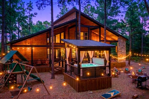 Fun packed with playset, hot tub, firepit area