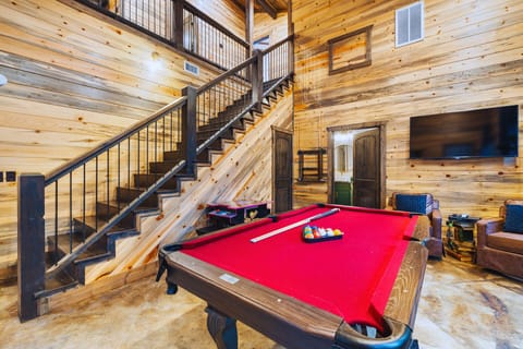 Game Area with Pool Table, Arcade, and TV