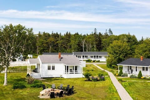 Stroll quiet paths between classic cottages and sunny lawns.