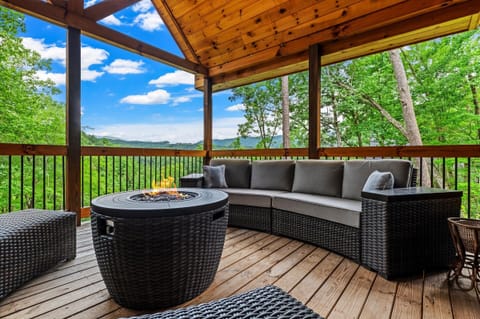 Cozy up around the fire pit and take in the stunning mountain views — the perfect spot for morning coffee or sunset chats.
