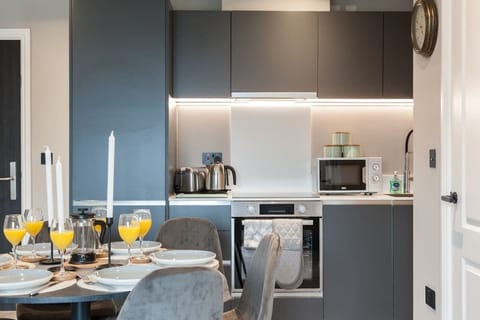 Gather around this elegant dining table, set in a well-lit space that’s perfect for meals, conversations, or a quiet coffee break