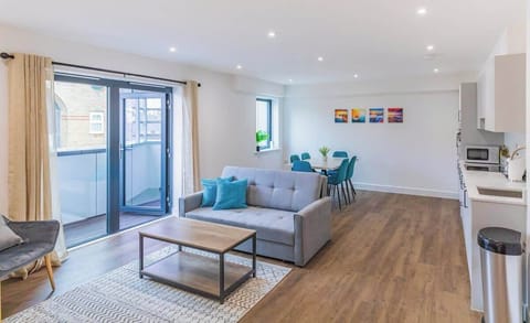 A cozy living room with soft lighting, plush seating, and warm, inviting decor perfect for relaxation and gatherings.
