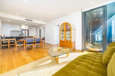 Settle into the airy living space, where clean design and soft touches create a retreat made for unwinding