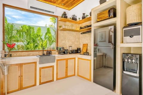 Modern, fully-equipped kitchen thoughtfully designed to provide all you need for effortless meal preparation