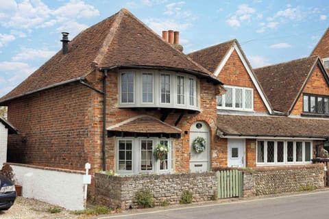 This beautifully restored cottage in East Wittering is brimming with charm and just metres from East Wittering beach!