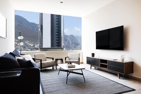 Relax in the living room with scenic views.