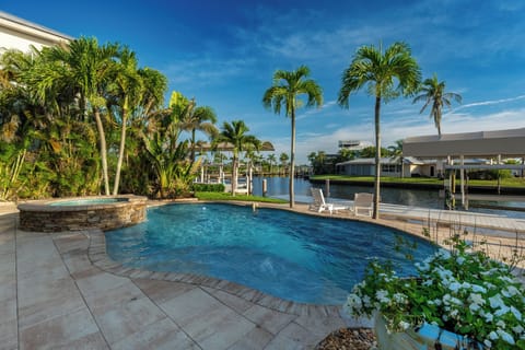 Soak in stunning bay views from your private pool at high tide!