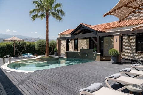 Luxury Poolside Escape Overlooking Majestic Mountains