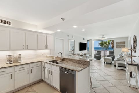 Fully renovated kitchen with granite countertops and stainless steel appliances