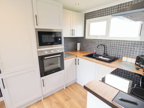 Fridge, microwave, toaster, cookware/dishes/utensils
