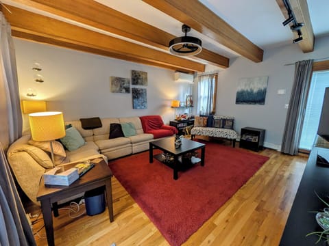 Relax on the main floor, up one level and adjacent to the kitchen, with balcony.