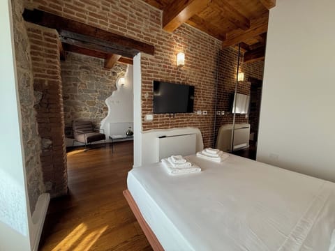 Luxury Double Room, City View | Minibar, in-room safe, desk, laptop workspace