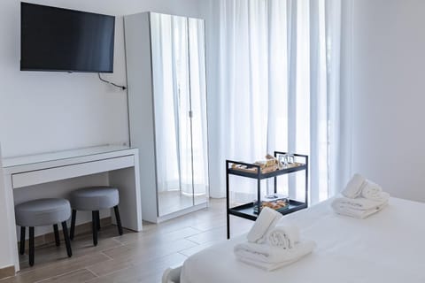 Exclusive Apartment, Balcony, City View | Desk, blackout drapes, iron/ironing board, free WiFi