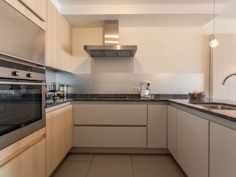 Kitchen, Kitchen Appliance, Countertop, Interior Design, Major Appliance, Cabinetry, Wood, Kitchen Stove, Home Appliance, Flooring