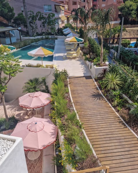 Indoor pool, outdoor pool, pool umbrellas, sun loungers
