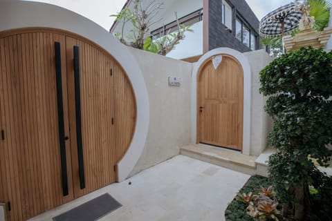 Secured entrance area with temple