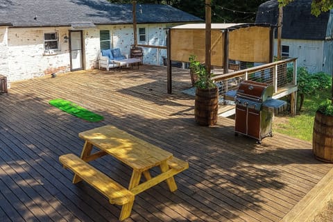 Gather with family and friends on this inviting patio, equipped with a BBQ grill