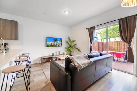 Basic Townhome, 3 Bedrooms, Patio | Living area | 60-inch flat-screen TV with cable channels