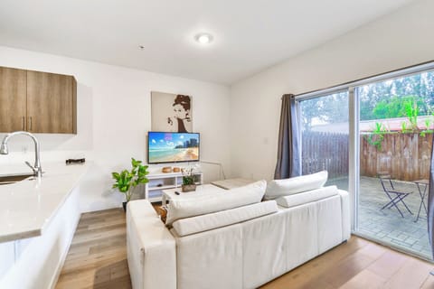 Family Townhome, 3 Bedrooms, Patio | Living area | 60-inch flat-screen TV with cable channels