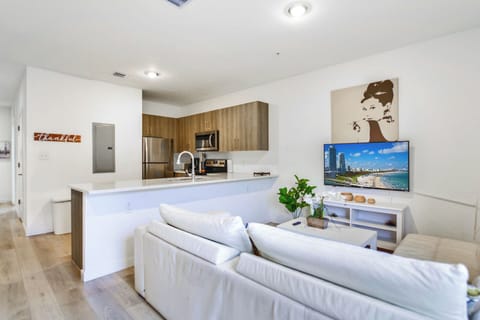 Family Townhome, 3 Bedrooms, Patio | Living area | 60-inch flat-screen TV with cable channels