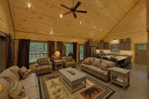 House, Multiple Beds, Hot Tub, Pool View (Adventure Lodge) | Living area | Fireplace