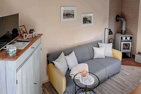 Wohnzimmer - Sofa & Kamin