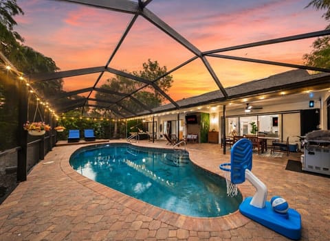 Poolside Oasis: Enjoy evening swims under twinkling lights in this serene outdoor retreat!
