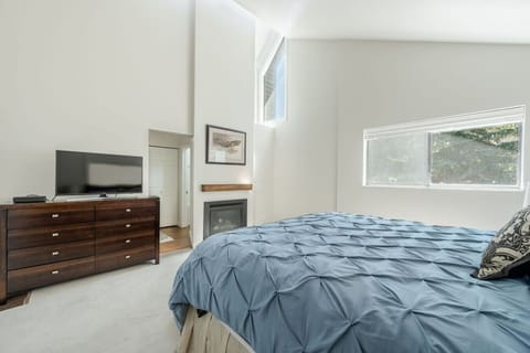 Spacious Master King bed with TV